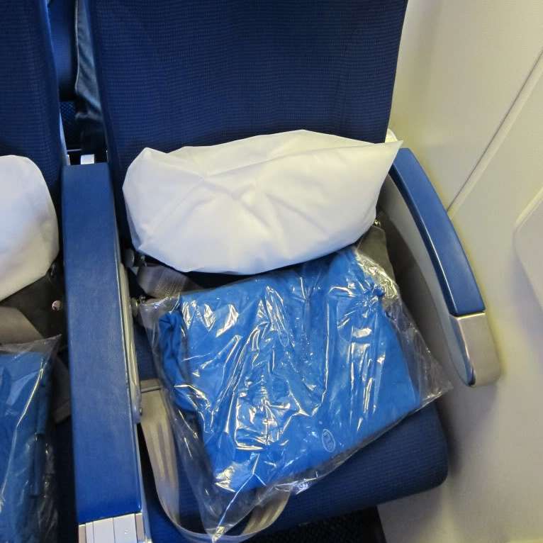 Blankets and pillows left on the plane are not washed before being given to another passenger.