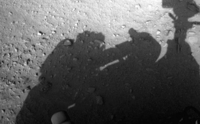 This is the very latest find to hit the web about the recent missions to Mars. As you can clearly see in the photo taken by NASA’s Curiosity rover, there’s a clear shadow of an actual person working on repairing the rover while standing right next to it. Most conspiracy theorists have jumped to various conclusions with the two most popular being that either a human is already capable of traveling to and living on Mars, or that the mission is a hoax and that the rover never even went there, and all these photos have been taken at the same studio where the moon landing was shot.