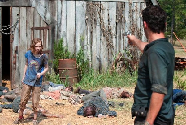 As the group kills the walkers that come out of the barn, the camera shows several different vantage points from in front of the barn, inside of the barn, etc. It shows the walkers lying with a clear path between them, and in another it shows the walkers lying in a jumbled pile with no path between them. This goes back and forth a few times until Sophia comes out of the barn, and there is no clear path again.