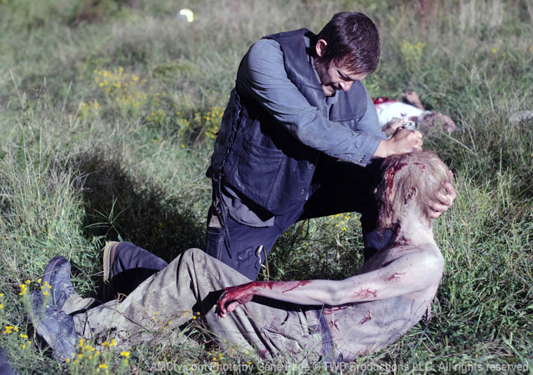 When Daryl is cutting open a walker in the woods to see what meat it ate while searching for Sophia, he stabs the walker several times, but the knife is not bloody and it stays clean.