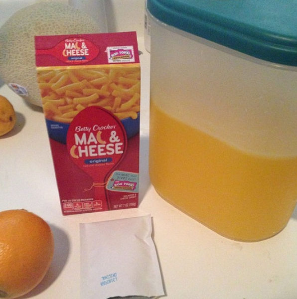 Fill up a pitcher with some “orange juice” (AKA the powder from a box of mac and cheese: it’s the exact same color!)