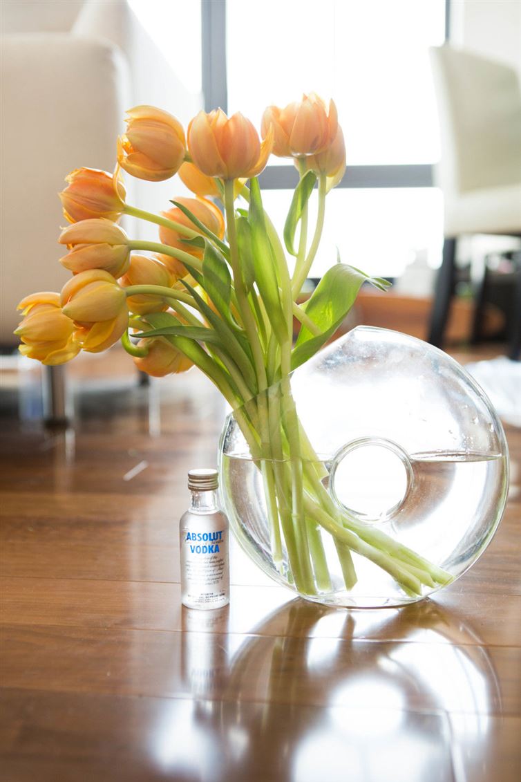 Create a vodka + teaspoon of sugar concoction to keep your flowers looking flawless for longer.
