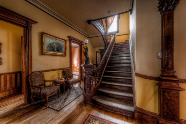 The S.K. Pierce Mansion has 10 bedrooms and 2.5 baths. It also has 11 foot ceilings, marble fireplaces throughout, and it still has all of the original windows, doorknobs, hinges, and floors.