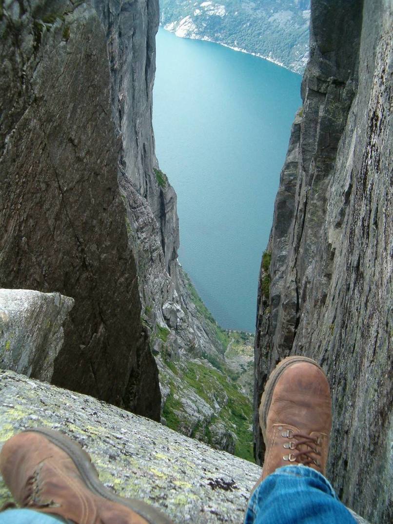 This rock sits 3,245 ft in the air between two boulders in Rogaland, Norway. You don't want to be present when gravity decides to bring this down.