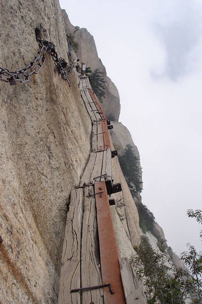 The trek up Mount Huashan is considered one of the most dangerous, yet popular ascents in China. Hundreds of tourists flock to the nearly vertical staircases and creaky bridges of this location.