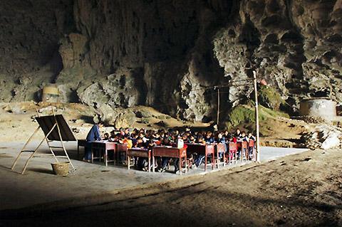 Dongzhong Mid-Cave Primary School, China.
Dongzhong Mid-Cave Primary School is in Miao village in Guizhou province, China. The word Dongzhong means "in caves". The school was started in 1984, as it is the poorest area of China. Instead of using resources the community started the cave school. It was started with eight teachers and 186 students. After 23 years, Chinese authorities shut down the school with the fear that China isn’t a “society of cavemen.”