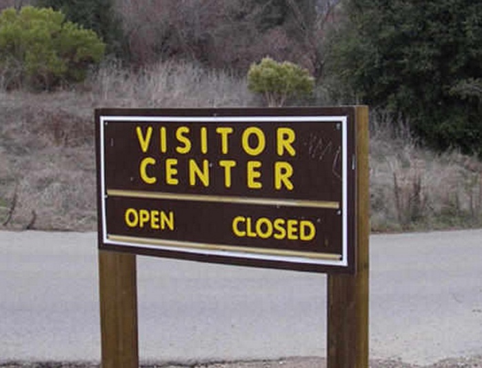 street signs that do not make sense - Visitor Center Open Closed