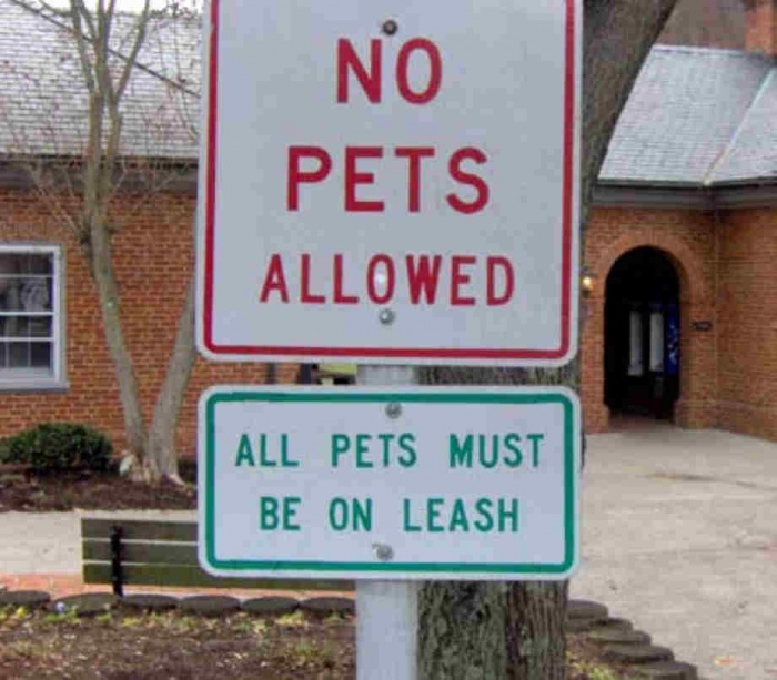 funny road signs - No Pets Allowed All Pets Must Be On Leash