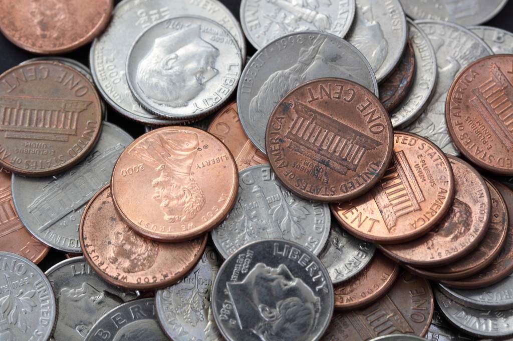 If you have 3 quarters, 4 dimes, and 4 pennies, you have $1.19. You also have the largest amount of money in coins without being able to make change for a dollar.