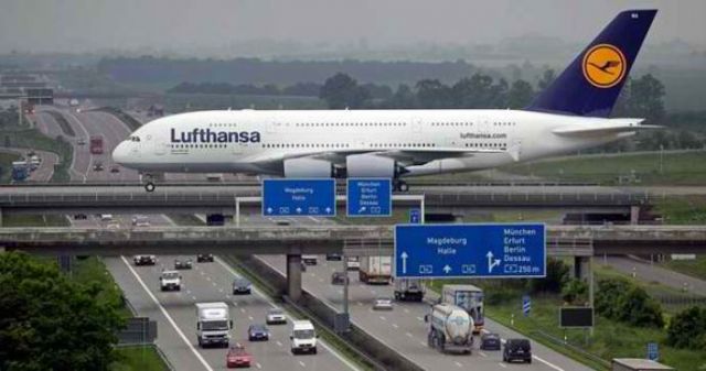 Airbus A380 crossing the Autobahn at Leipzig airport in Germany.