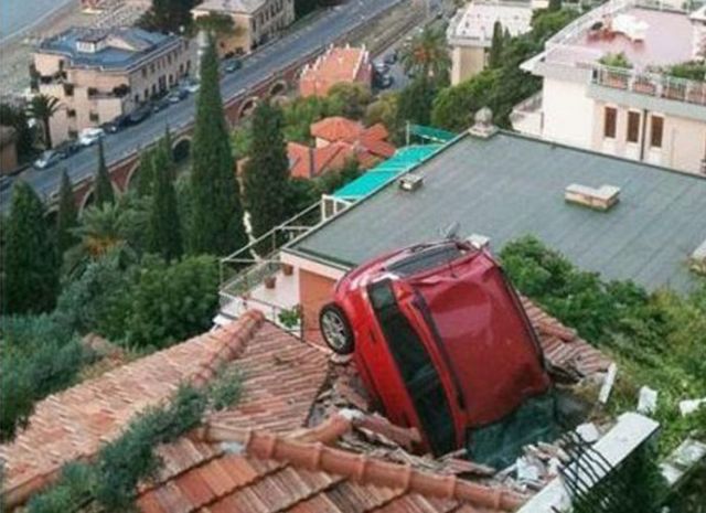 A Fiat Panda ended up rolling off the street into a roof when the owner forgot to put on the handbrakes.