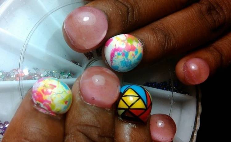 Bubble nails trend.  One of the weird beauty trends on social media I have ever seen.