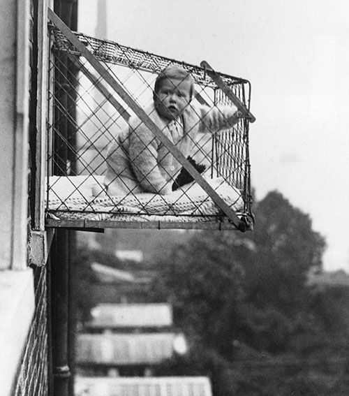 Suspended Baby Cage:
If you want your baby to get some fresh air but are too drunk or agoraphobic to take them outside, why not place them several stories above hard pavement in an apartment window? The suspended baby cage will let your neighbors know you learned everything about humane treatment by watching circus animal trainers.