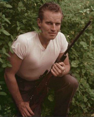 Charlton Heston.
Before he parted the seas and damned the apes to hell, Charlston Heston took his NRA skills right into WWII. He rose to the rank of Staff Sergeant which would later give him Q clearance to narrate highly secretive military films.