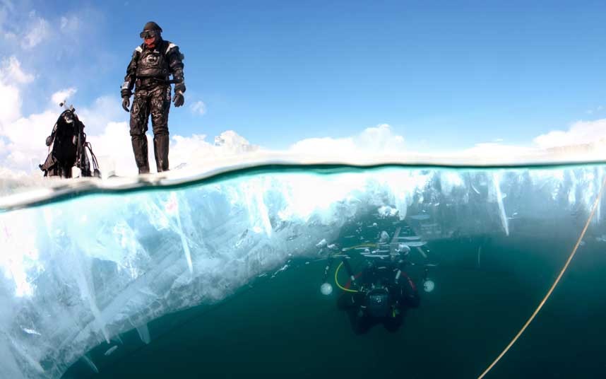 Underwater tree planting, Siberia.
A custom of cutting a hole in the ice covering Lake and diving in while carrying a tree.