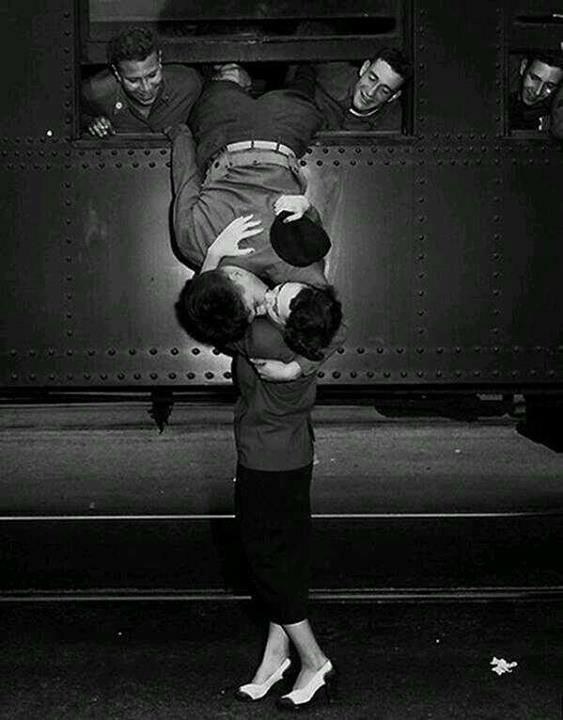 A goodbye kiss in 1950 between a soldier and his love.