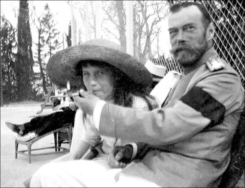 Tsar Nicholas II allows his daughter, the Grand Duchess Anastasia, to smoke.
