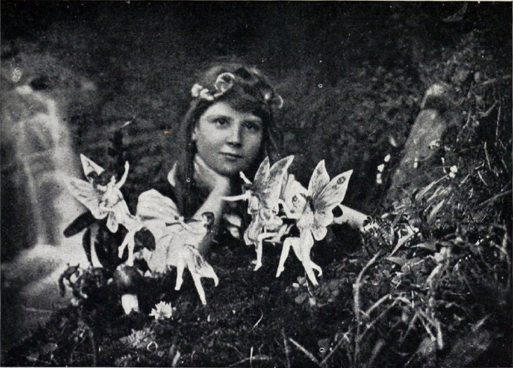 The "Cottingley Fairies" were captured in a series of photographs by two young cousins Elsie Wright and Frances Griffiths in 1917.  The images were an instant sensation, even fooling Sir Arthur Conan Doyle, who interpreted them as clear and visible evidence of psychic phenomena. It wasn't until 1983 that the two girl finally admitted that they faked the photos using cardboard cutouts.