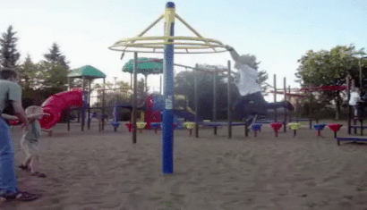 Fail GIF of dad trying to add another kid to the spinning game and he goes flying