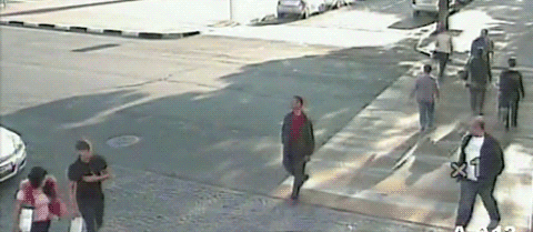 Man stops daughter right before she goes into the road in which a car zips by moments later.