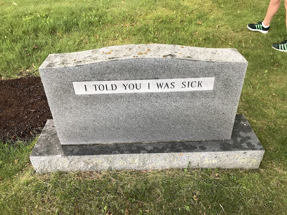 Sign on a tombstone that says I TOLD YOU I WAS SICK