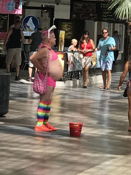 Fat cross dress street performer