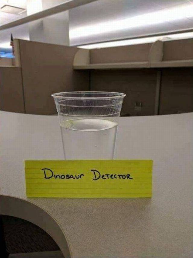 cup full of water marked as Dinosaur Detector