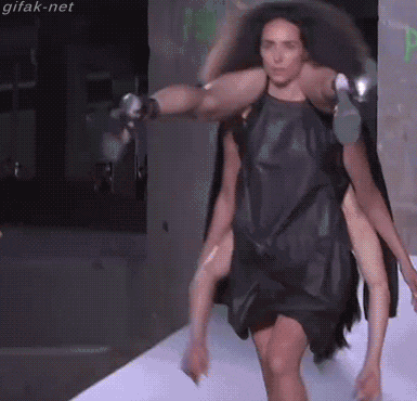 GIF of runway model wearing a person