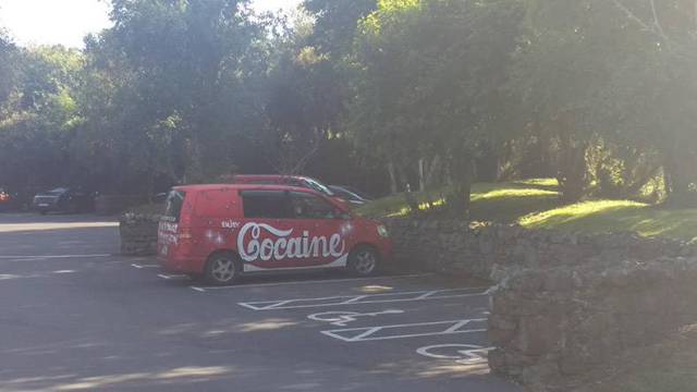 Coca Cola car that is painted as Cocaine in the same font.