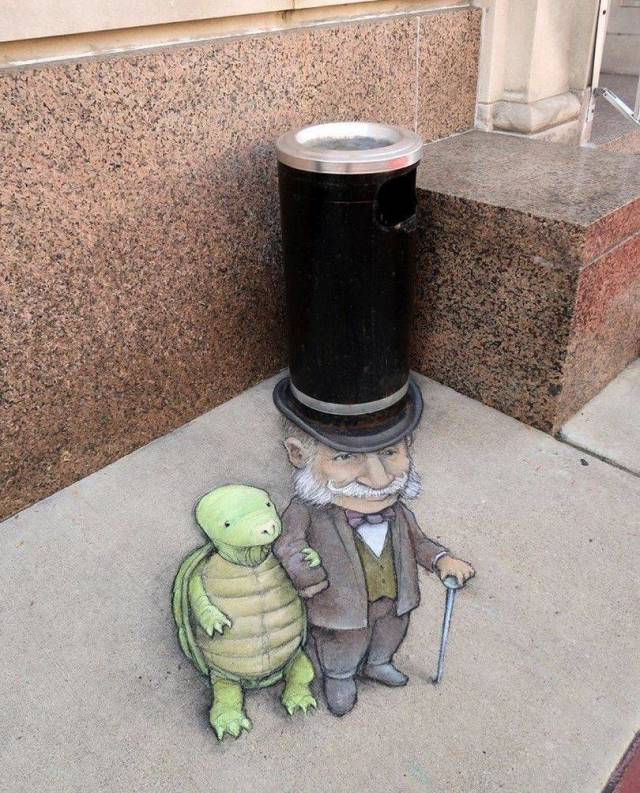 cool forced perspective artwork on the sidewalk