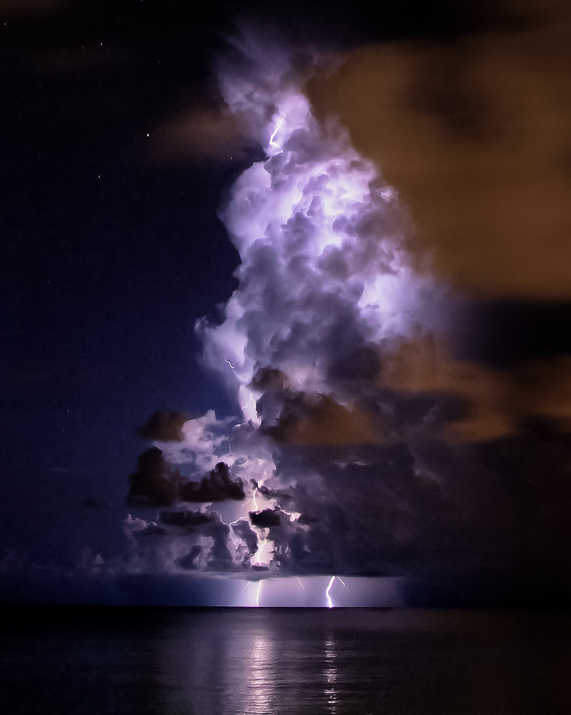 Cloud illuminated by lightning