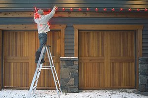 No. 19 Putting up Christmas lights outside and taking them down after