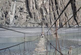 Cross the world's most dangerous bridge in PakistanThe Hussaini-Borit Lake bridge in northern Pakistan is made from rotting wooden planks that look like they are about to come apart at a