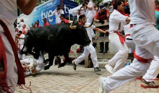 Bull Running in Spain-You thought riding on top of a bull was dangerous Try outrunning one. No wait,make that one hundred.