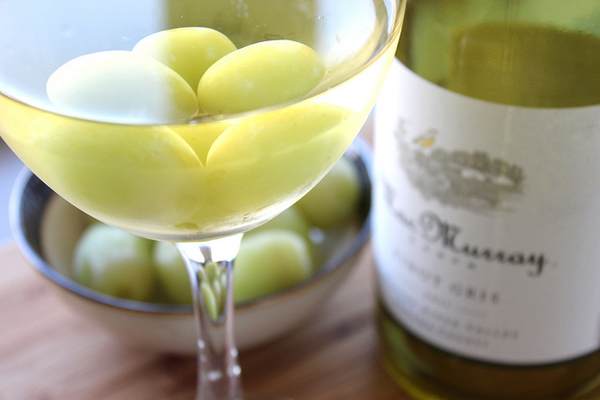 Chill your white wine with frozen grapes