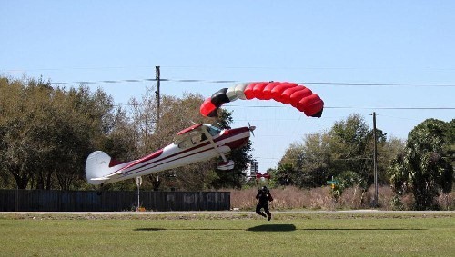 Plane Snags Parachutist!