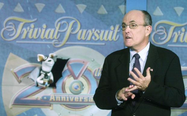 Trivial Pursuit - Here's one for the orange category: What board game was invented in 1979 by Scott Abbott, a Montreal sports editor, and Chris Haney, a photo editor, when they couldn't find all their Scrabble tiles? And yes, that's Rudy Giuliani and the Pets.com sock puppet in the photo.