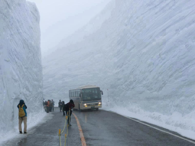 This is how the Japanese clear a snow-buried road.