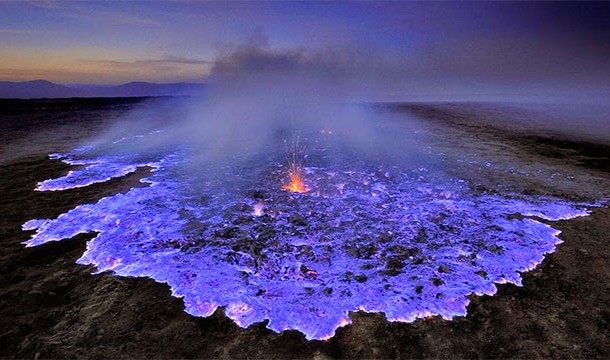 Blue Lava, Indonesia-The glow comes from the combustion of sulfuric gases that are pushed through the cracks of the volcano at high temperatures.