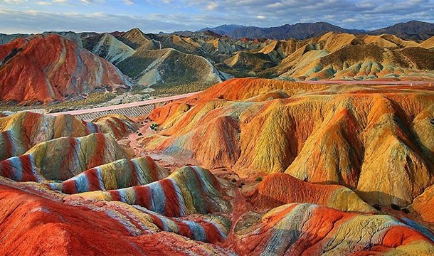 Danxia Landforms, China-These amazing colors are the result of red sandstone and mineral deposits laid down over millions of years.