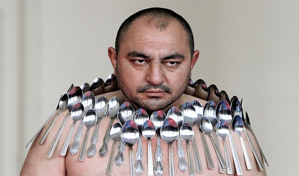 Etibar Elchiyev balanced 53 spoons on his body in 2013 in Tbilisi, Georgia