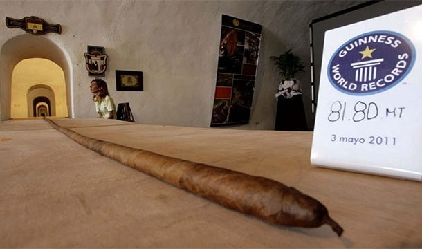 The longest cigar was 81.8 meters, or most of the length of a football field,.