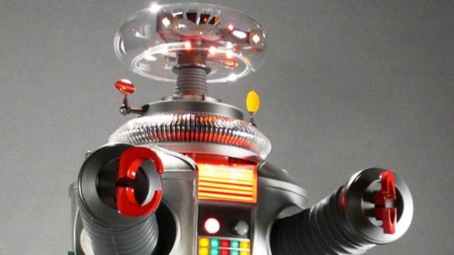 Despite that The Robot has no given name in the Lost in Space movie, this Class M-3 Model B9 goes beyond its usual function as a General Utility Non-Theorizing Environmental Control Robot as it shows human emotions and can interact with humans. It also knows how to play the electric guitar while showing its revolutionary weapons and employing its superhuman strength when necessary
