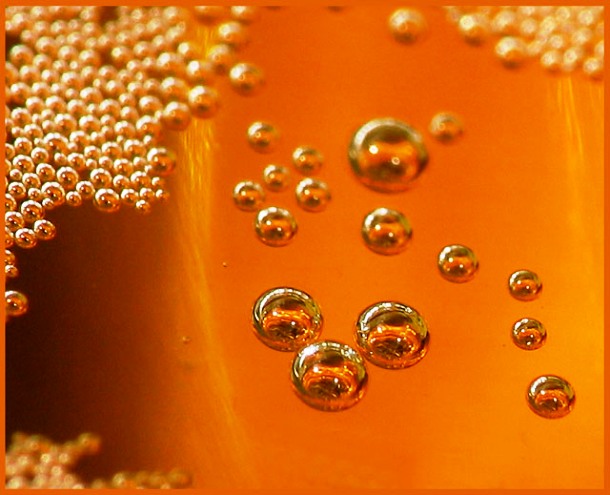 Stanford researchers found that beer bubbles create a gravity-defying loop. Bubbles head up in the center where frictional drag from the glass is less and down on the outside as the top gets crowded.