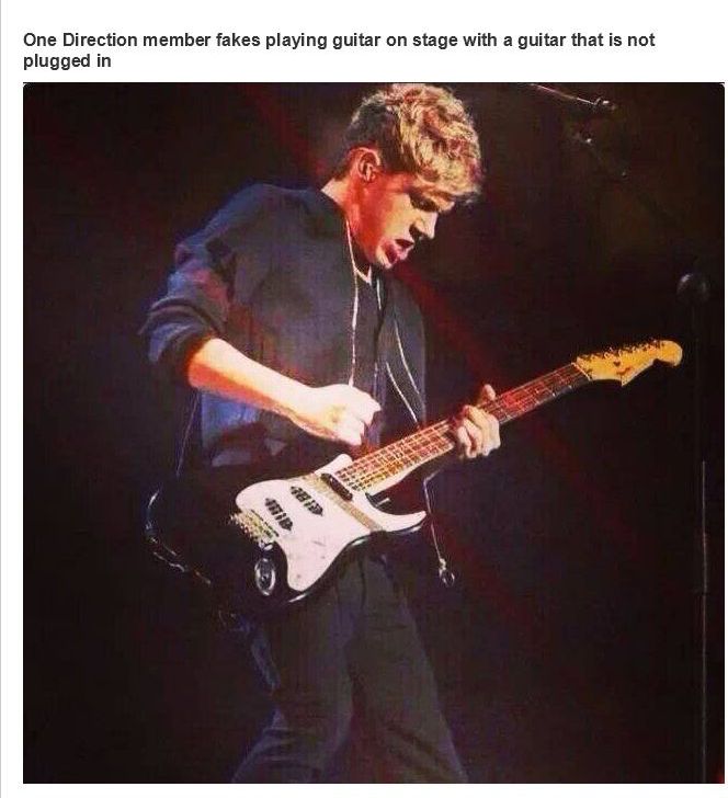 Fascinating photos - one direction playing guitar not plugged - One Direction member fakes playing guitar on stage with a guitar that is not plugged in det