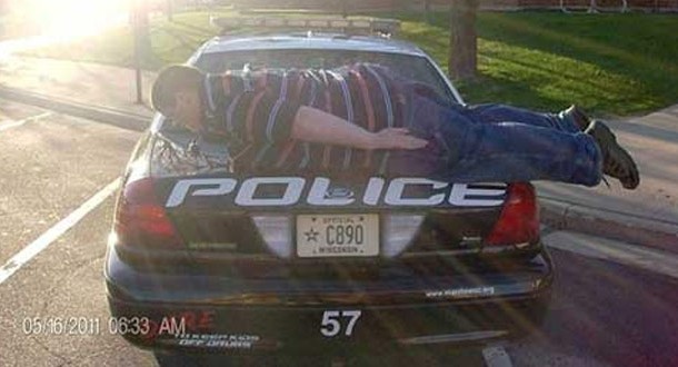 Nate Shaw, 20, of Gladstone in the state of South Australia found himself on the wrong side of the law after local police saw a photo of him on Facebook planking on a police cruiser. Shaw was issued a notice to appear on a charge of being found on police property without lawful excuse.