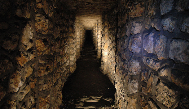 Originally, the catacombs served as tunnels and caverns for stone mining in Roman times.