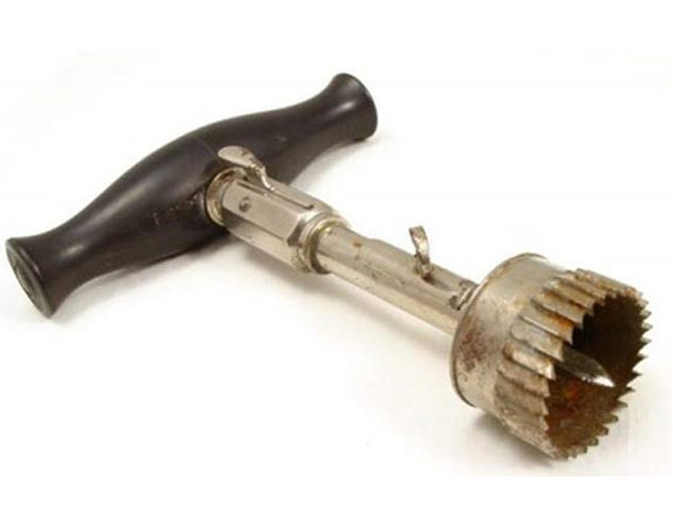 Trepine: Another device designed to get into someones skull was this hellish looking thing. The trephine was a hand-powered drill with a cylindrical blade and was used to bore into the patient's skull. The spike in the center started the procedure and held the blade in place.