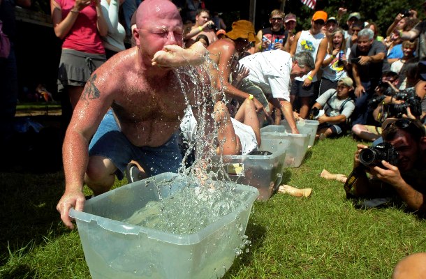 Bobbing for pigs feet-Bobbing for pigs feet is one of the crazy disciplines of the Redneck Games held annually in East Dublin, Georgia. Started in 1996 as a charity and a spoof of the Summer Olympics, the first games attracted about 5000 people which was over the twice the population of East Dublin.