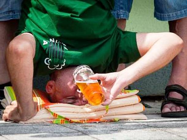 Headstand beer drinking-Headstand drinking is just one of several crazy disciplines of an annual fun sport event called Wonder Week held in Opava, Czech Republic. Other disciplines include olive spitting, beer relay or egg throw and catch. In 2014, the 41st year of the event was held.